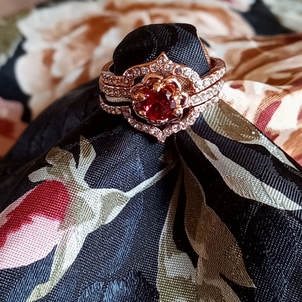 Pink and Gold Vintage-Inspired Ring with Intricate Halo